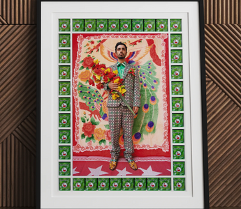 Portrait of a middle-aged man in a dark suit jacket highlighting maximalist art influences like liza lou and sanford biggers