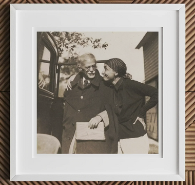 Framed black and white photograph from alfred stieglitz collection featured in article about georgia okeeffe and vintage camera operator