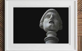 Marble bust of a man with anguished expression looking upward featured in cue the chorus by miranda costa currency press