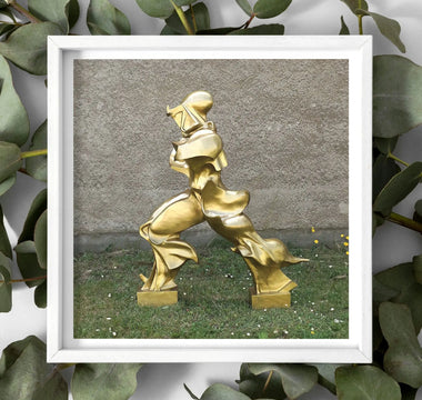 Golden abstract sculpture of a stylized human figure in motion representing retro futurism and futurism art by gino severini