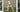 Golden abstract sculpture of a stylized human figure in motion representing retro futurism and futurism art by gino severini
