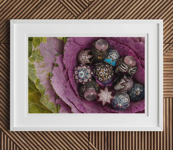 Collection of ornate jewelry beads and charms in a purple cabbage leaf for matthew campbell laurenza one-of-a-kind wearable sculpture