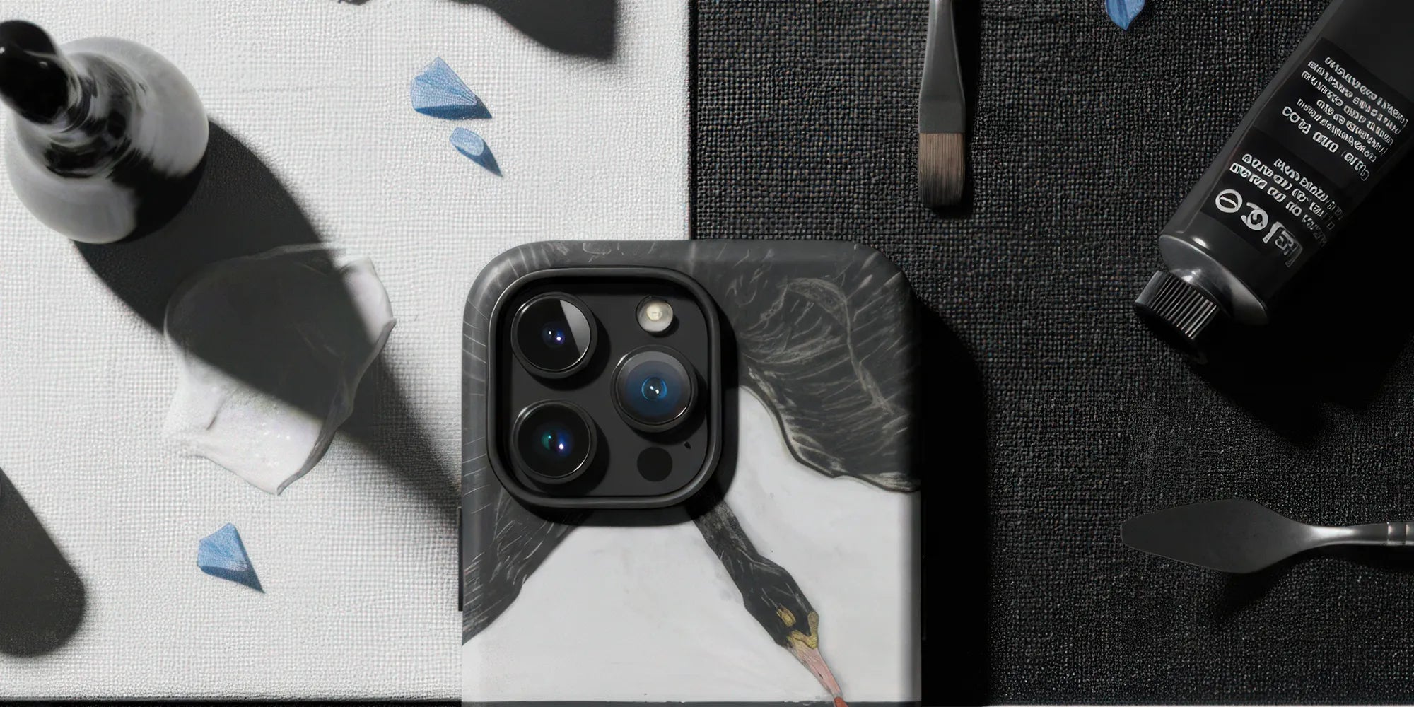 Decorative phone case featuring a nature-inspired design with a bird, butterfly, and floral elements.