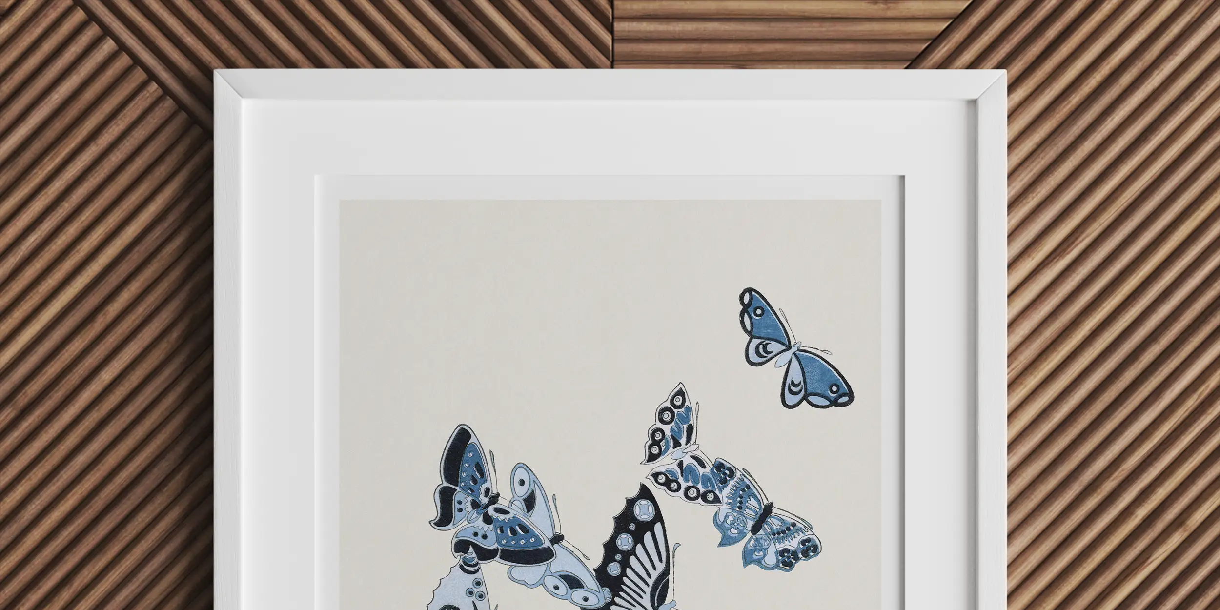 Framed artwork depicting blue and white butterflies in flight.