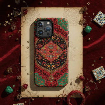 Ornate floral-patterned phone case held in a hand.