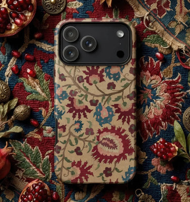 Floral Phone Cases with a vibrant floral design surrounded by pink flowers and decorative accessories.