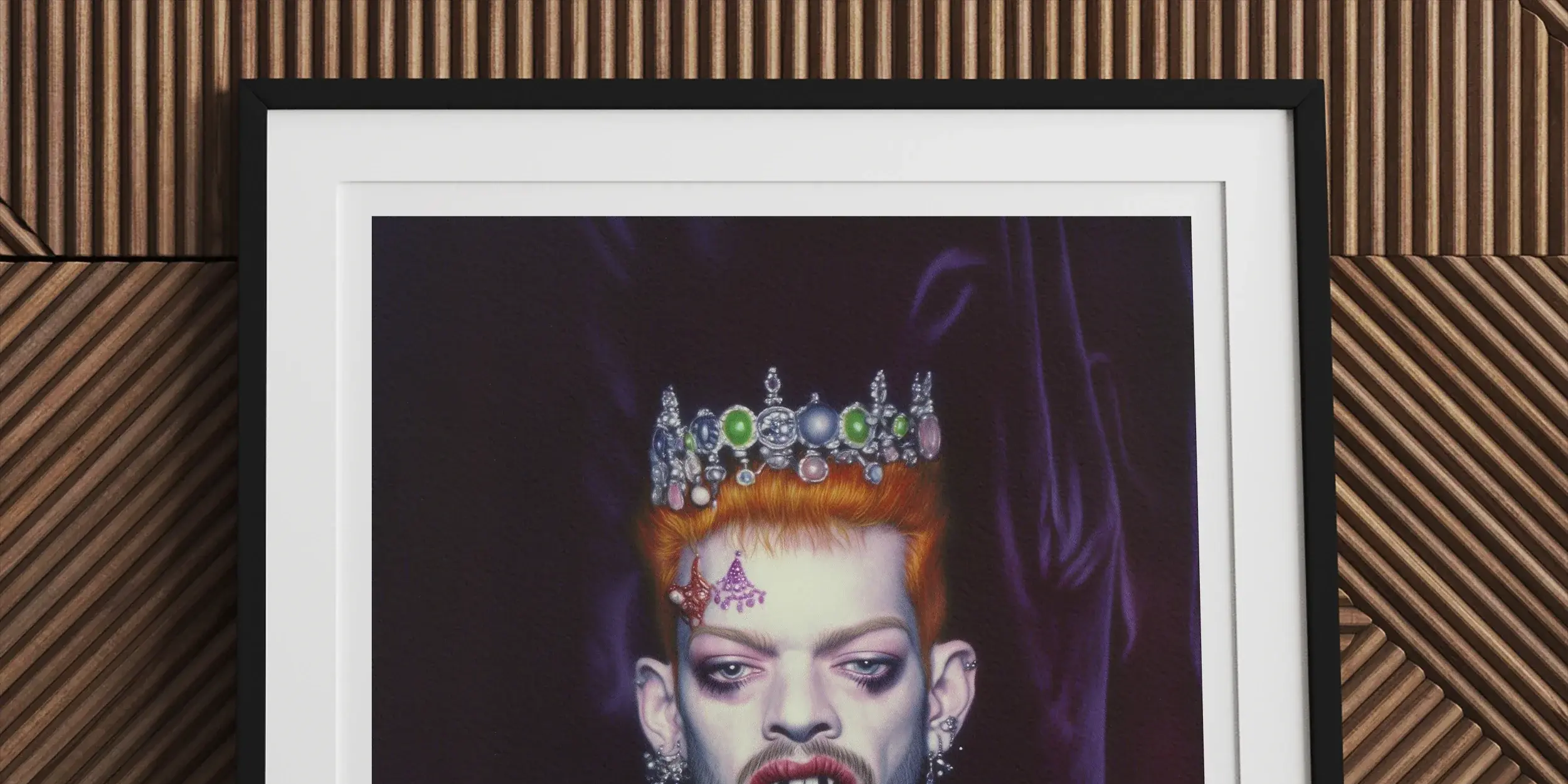 Framed portrait of a person wearing a crown, vampire fangs, and elaborate jewelry against a dark background.