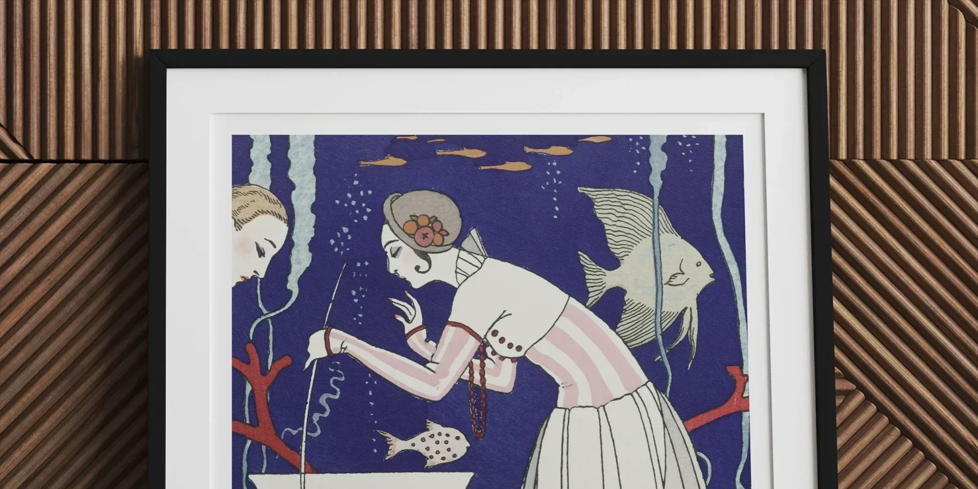 Framed art print featuring an Art Deco-style illustration of a figure in a white dress looking into a fish bowl.