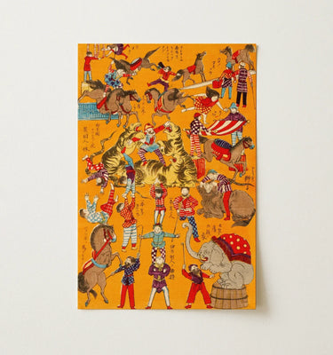 Colorful graphic wall art depicting circus performers and animals on a vibrant orange background.
