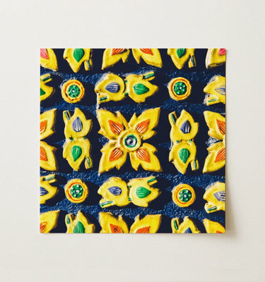 Industrial Maximalist Wall Art: Framed colorful geometric pattern artwork with intricate floral and arabesque designs in blue, gold, and orange.