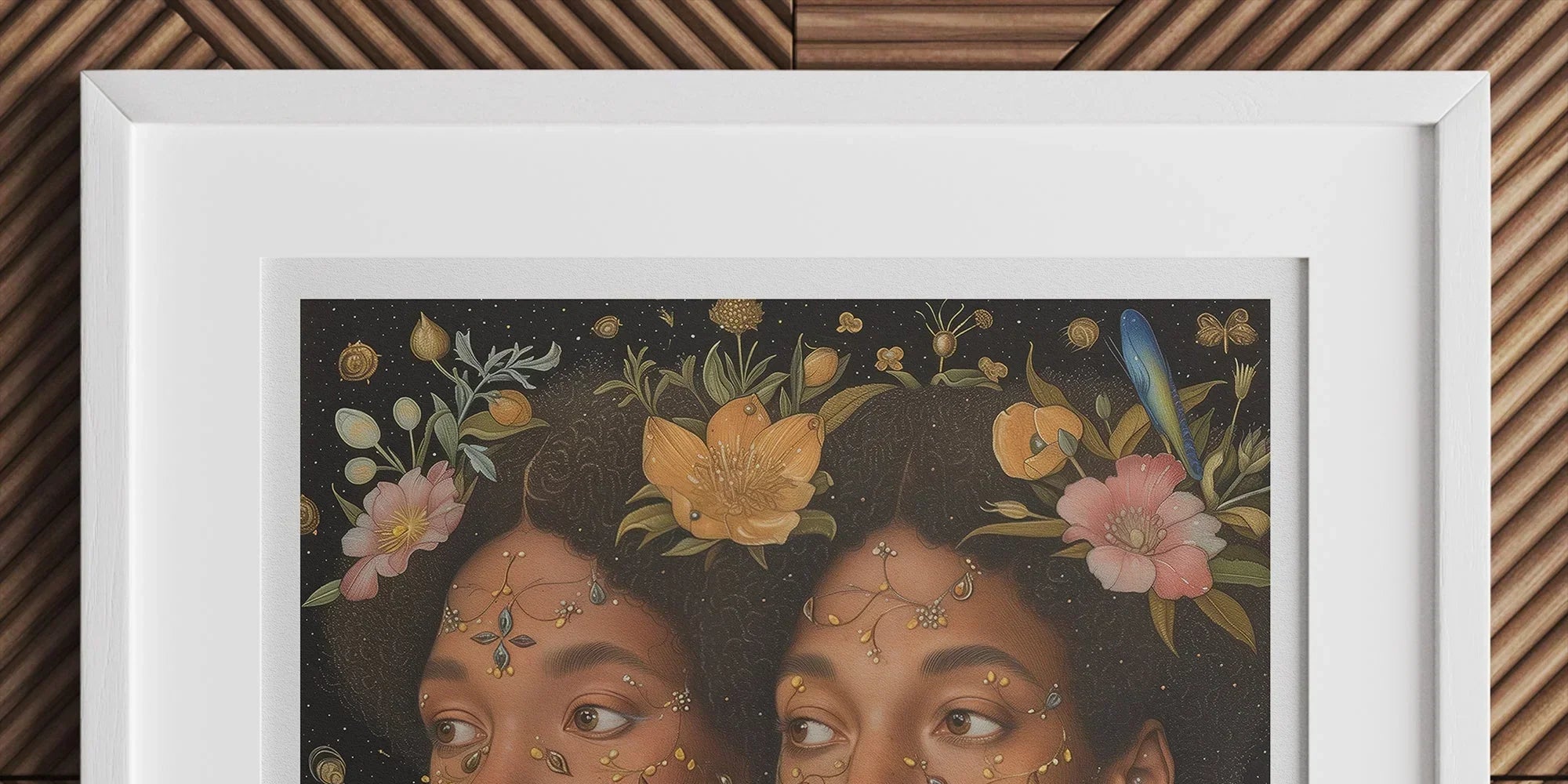 Framed portrait of two women with flowers adorning their hair and surrounding them against a dark background.
