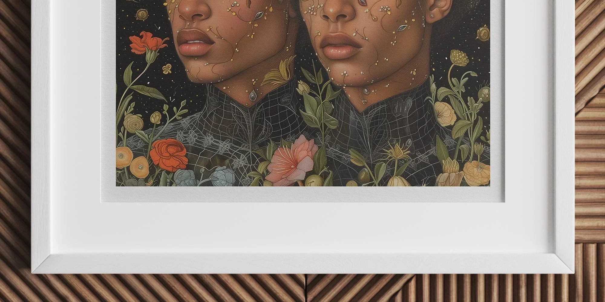 Framed portrait of two women with flowers adorning their hair and surrounding them against a dark background.