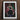 Framed painting of a person in green clothing sitting on a chair.