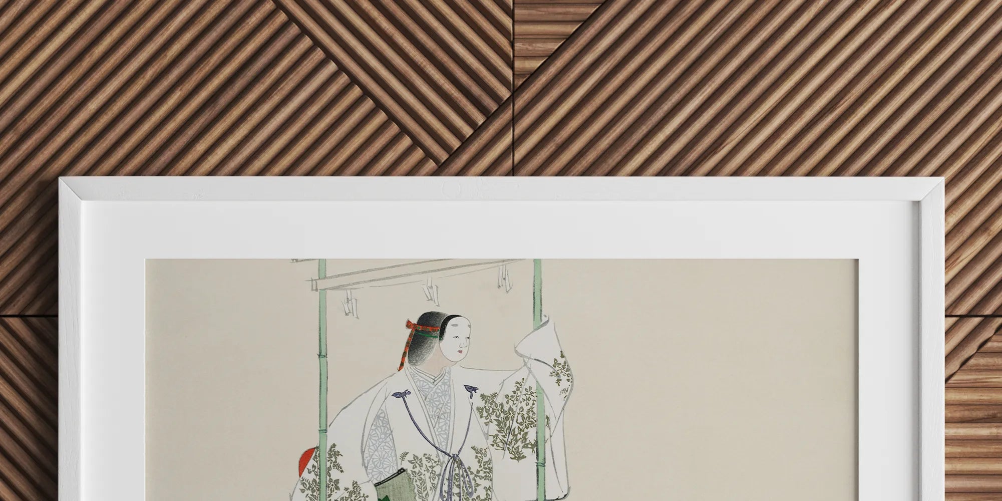 Framed artwork depicting two figures in traditional East Asian attire amid plants.