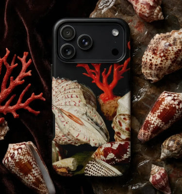 Ocean themed phone cases featuring colorful koi fish and blue wave designs on a sleek phone case.