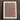 Framed floral and animal print artwork with colorful embroidered or painted designs on a light background.