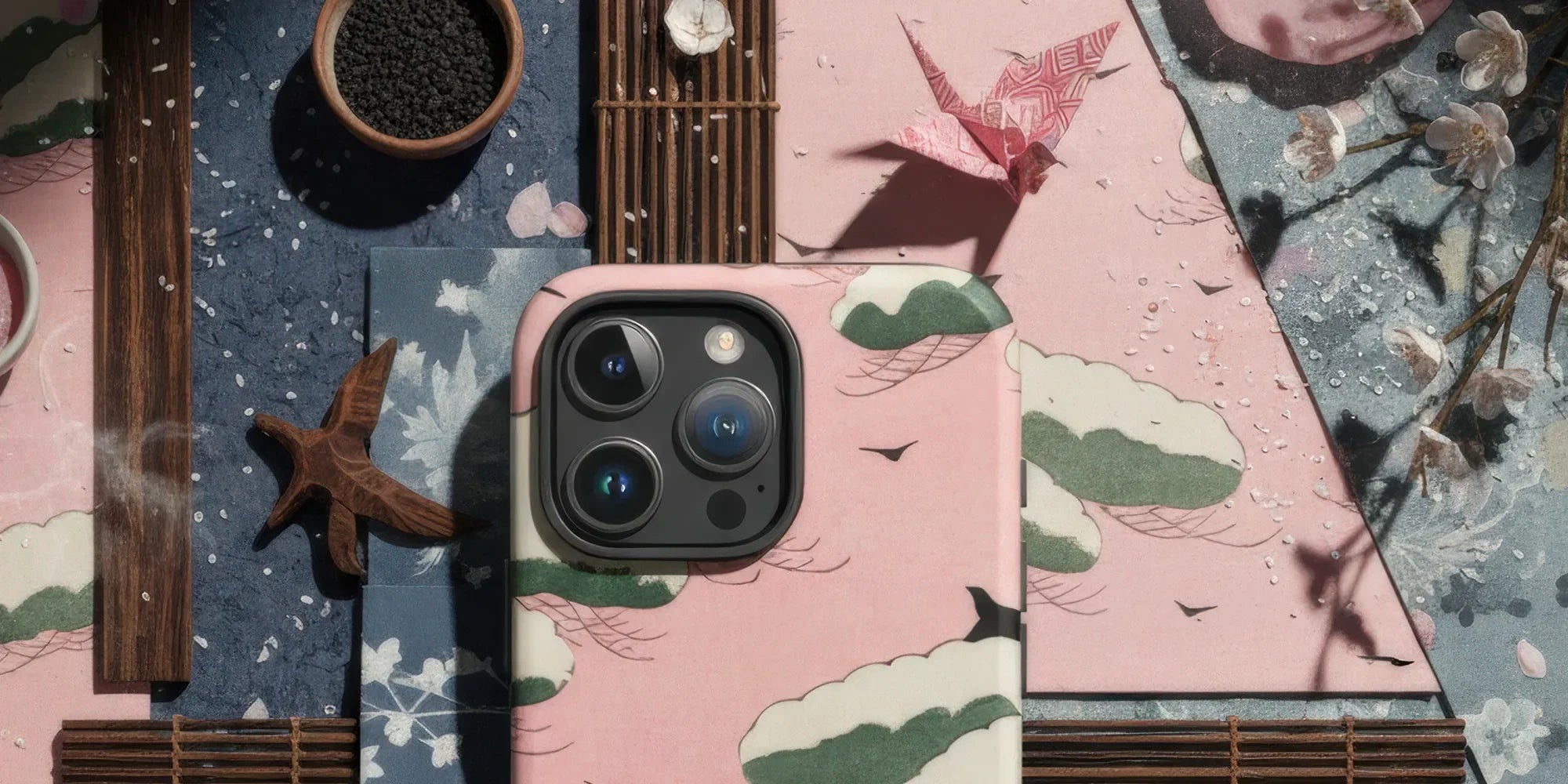 IPhone case featuring a vibrant pink flower design.