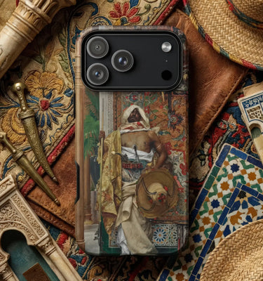 Spanish phone cases featuring a dynamic artwork on a smartphone surrounded by decorative elements and mystical objects.