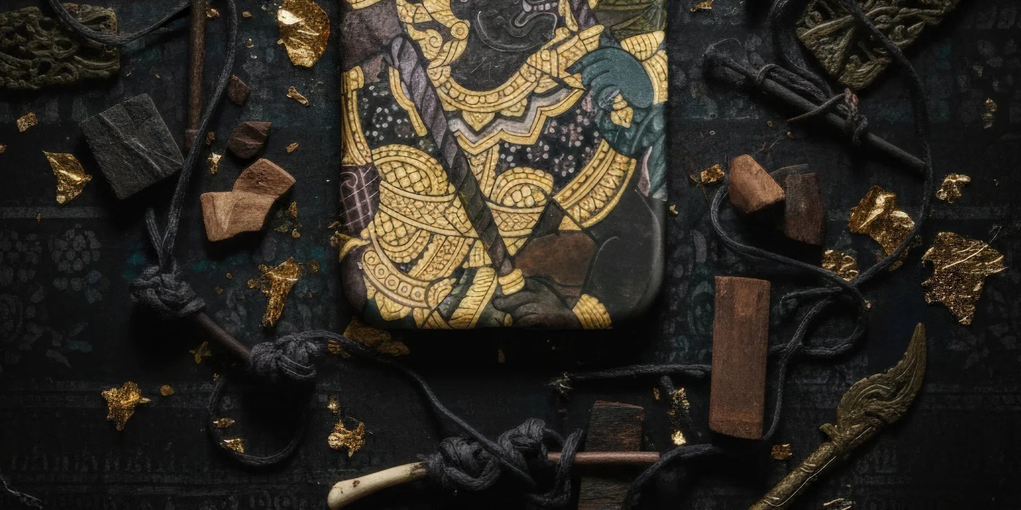 Ornate phone case with Thai art.