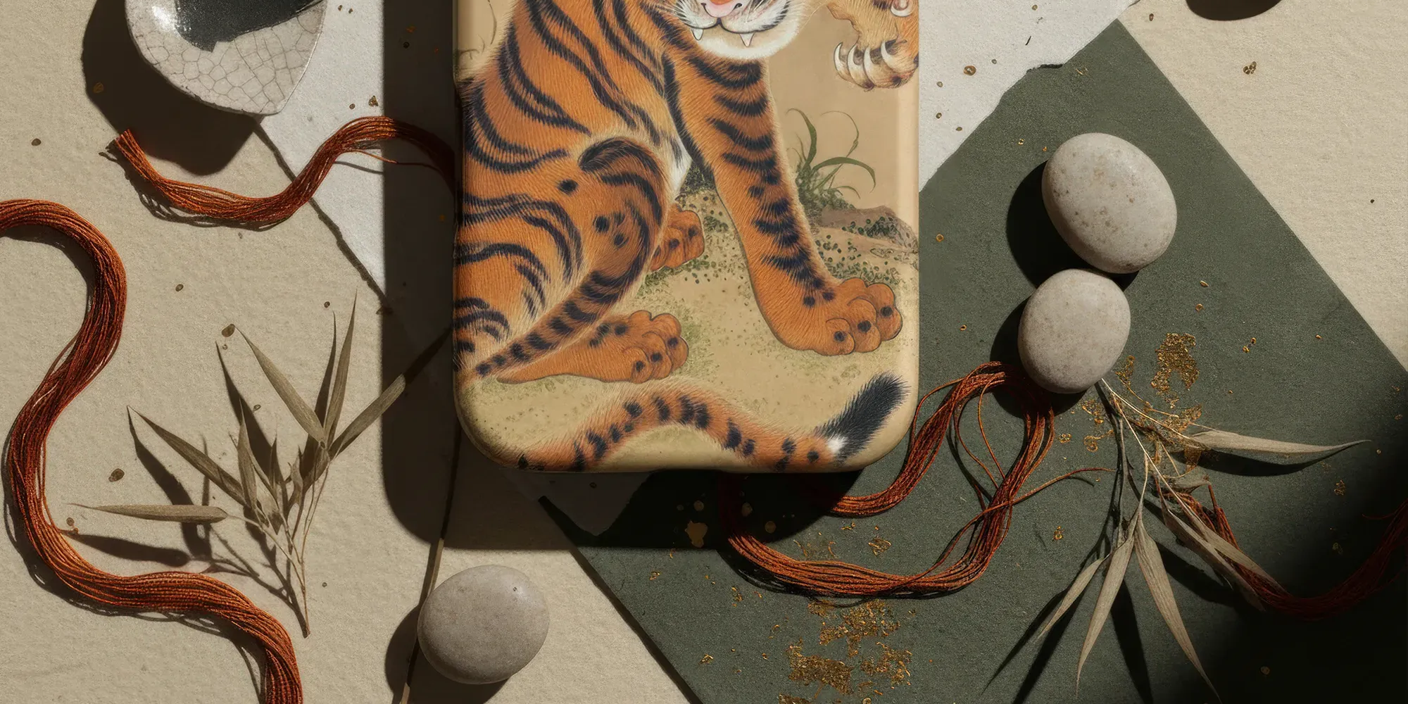 White phone case with tiger design.