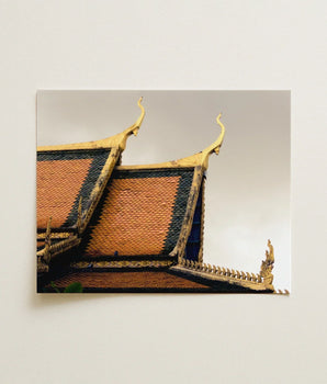 Square-framed Photograph Traditional Thai Temple Roof Ornate Golden Cambodian Photography, Temple’s Embodies Timeless Grandeur, Brooding