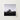 Black-and-white Framed Photograph Stone Chapel Tree Open Field Brick House with Muted Silver, Blank Sky Cloud Cover, Light Seeps Through