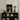 Sleek Black Cube Unit Books Stones Decorative Items Interracial Gay Erotica, Three Bodies Chained, Art Print