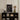 Sleek Black Cube Unit Books Stones Decorative Items Mariano Fortuny Marsal, Captures Anatomy, Charcoal Shadows Sculpt