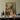 Framed Painting Light Wood Frame Impressionistic Scene Shirtless Bare-chested Silhouettes Dissolve, Luxe Vintage Circuit, Chandelier