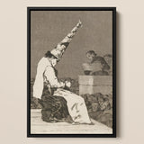 Those Specks of Dust - Francisco De Goya Art Print / Canvas Black-framed Artwork Figure Ornate Tall Conical Hat Seated Dissects, Decayed