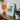 Turquoise Chair - Majel G. Claflin Decorative Art Print, Orange Glass Table Lamp Ribbed Base Wide Shade
