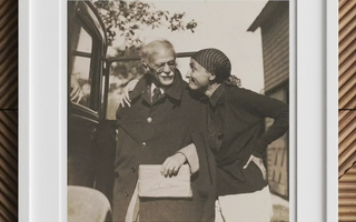 Framed black and white photograph from alfred stieglitz collection featured in article about georgia okeeffe and vintage camera operator