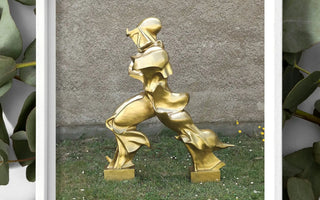 Golden abstract sculpture of a stylized human figure in motion representing retro futurism and futurism art by gino severini