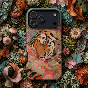 Tiger Phone Cases featuring a fierce tiger design on a phone case surrounded by natural elements.