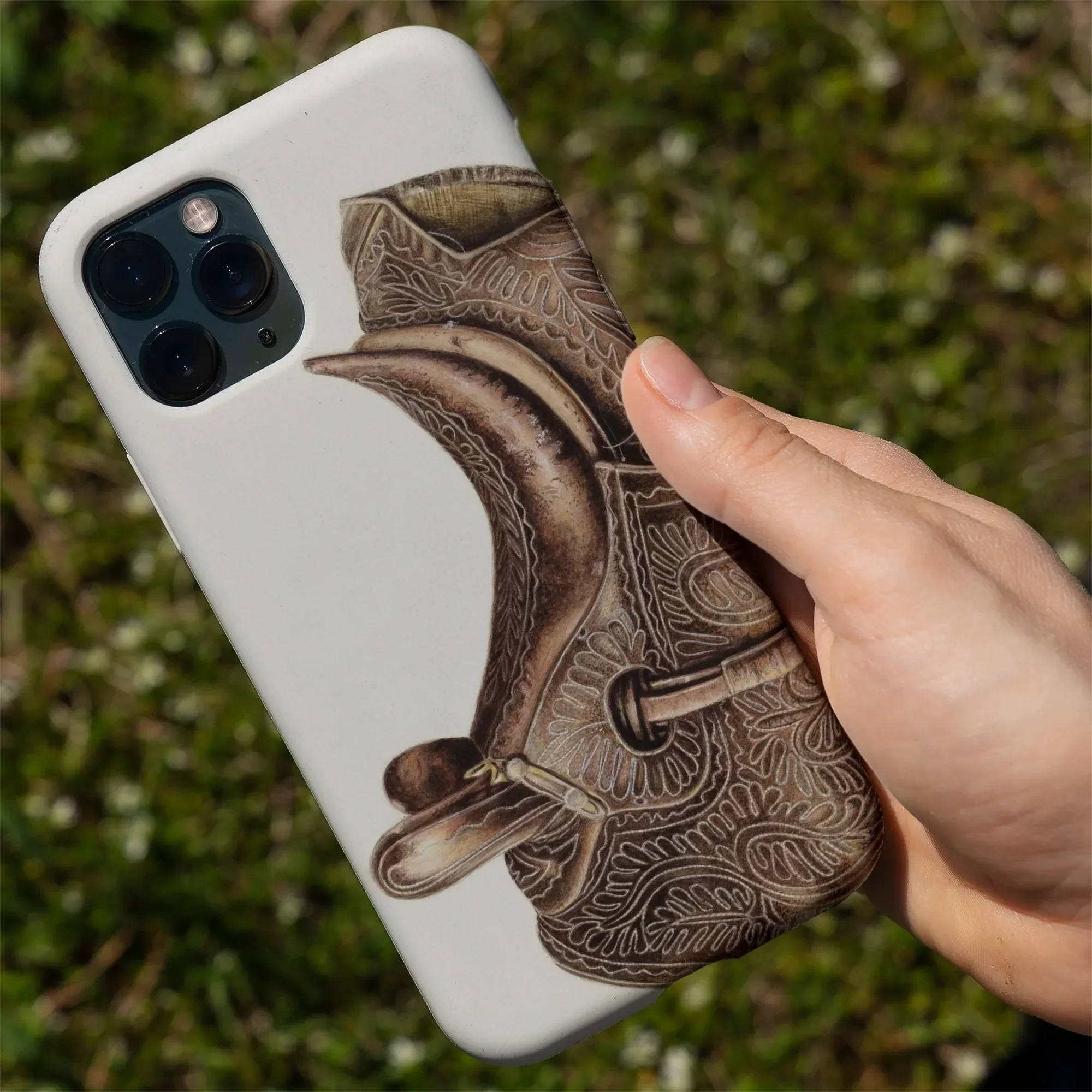 Ornate saddle-design phone case.