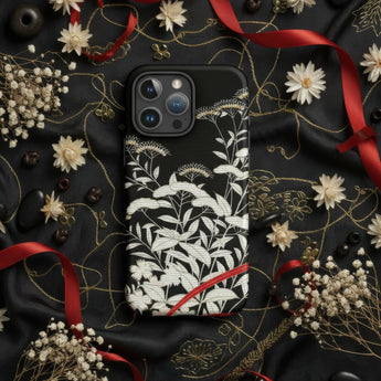 IPhone with a decorative floral pattern case.