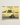 A framed photo of a man cycling a rickshaw past a yellow wall, representing urban life in concrete jungle art.