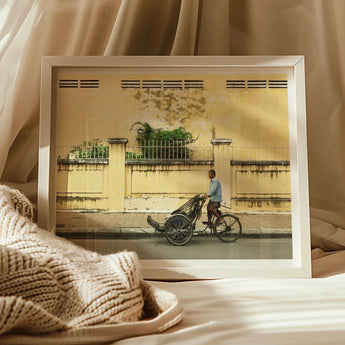 Framed rickshaw photograph.