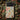 Colorful decorative phone cases set on a rich, patterned fabric background showcasing folk art elements.