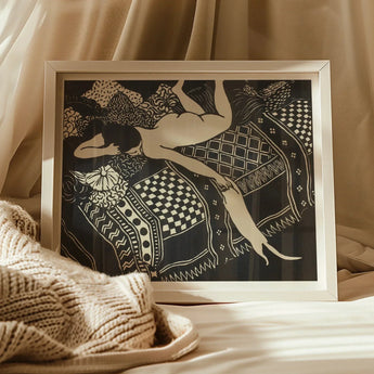Framed black and white artwork depicting a figure floating among decorative geometric patterns and designs.