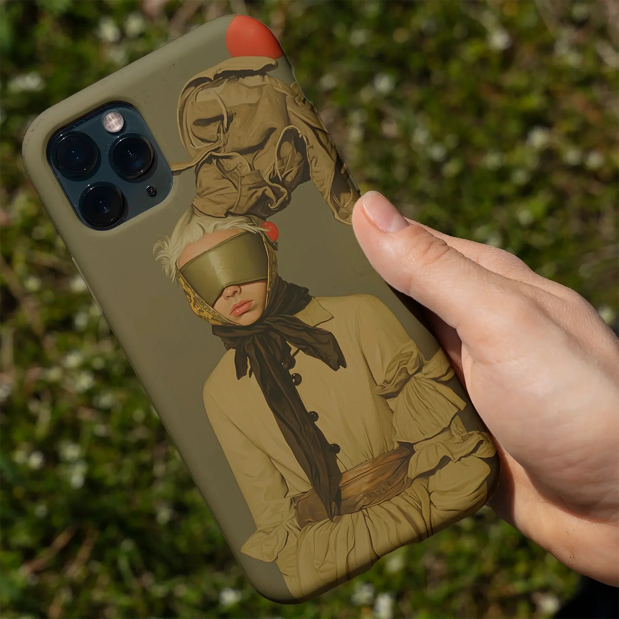 Olive green phone case with a portrait.