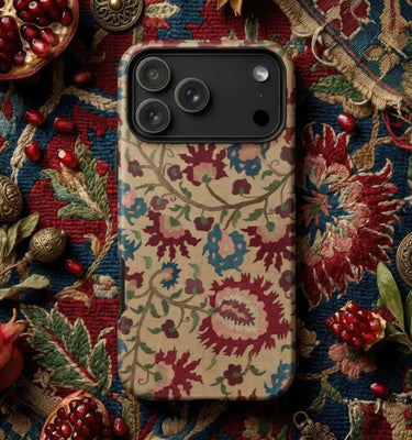 Floral Phone Cases with a vibrant floral design surrounded by pink flowers and decorative accessories.
