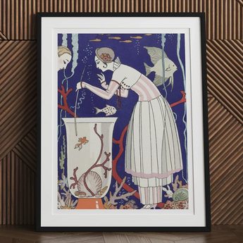 Framed art print featuring an Art Deco-style illustration of a figure in a white dress looking into a fish bowl.