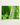 Green Wall Art featuring vibrant close-up of lush green leaves in a white frame, perfect for nature-inspired decor.