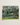 Landscape wall art featuring people and lush trees, capturing a serene and vibrant outdoor scene.