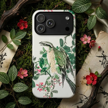 Numata Kashu phone case featuring a beautifully illustrated bird perched on a leafy branch surrounded by flowers.
