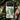 Numata Kashu phone case featuring a beautifully illustrated bird perched on a leafy branch surrounded by flowers.