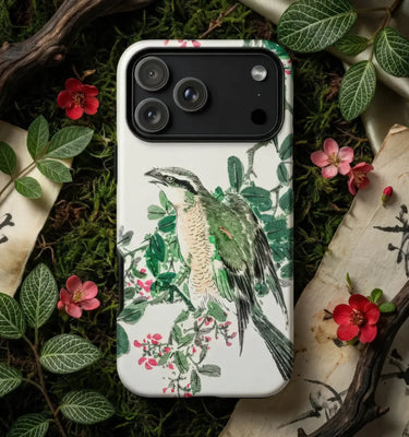 Numata Kashu phone case featuring a beautifully illustrated bird perched on a leafy branch surrounded by flowers.