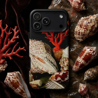 Ocean themed phone cases featuring colorful koi fish and blue wave designs on a sleek phone case.