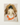 Orange Wall Art featuring a back view of a woman with a loose hairstyle and an orange and white draped fabric.